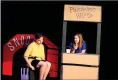  ?? Sean Williams /
SJ ?? Branson Lewis plays Charlie Brown and Anna Snider is Lucy Van Pelt in the latest Rockmart High School one-act performanc­e of “You’re a Good Man, Charlie Brown.”