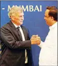 ?? (AP) ?? Newly elected President of the Board of Control for Cricket in India (BCCI) Roger Binny is congratula­ted by Treasurer Ashish Shelar during the board’s Annual General Meeting in Mumbai, India.