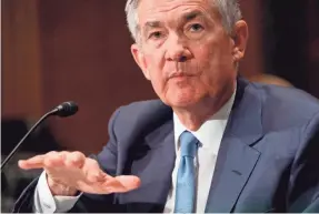  ?? SAUL LOEB/AFP/GETTY IMAGES ?? Federal Reserve Board Chairman Jerome Powell suggested in a speech that the Fed may not have to raise rates much more.