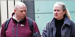  ?? ?? Forced sale...Mark and Louise Coates outside High Court hearing into row