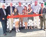  ?? Contribute­d photo ?? LCN USA and the new River Valley Esthetics Institute held a ribbon cutting in Deep River July 29. From left are Middlesex County Chamber of Commerce President Larry McHugh, Middlefiel­d First Selectman Ed Bailey, Chase Gilbert, owner Patrick Gilbert, Ava Gilbert, owner Tina Gilbert, Deep River First Selectman Angus McDonald, and Tim Larson of the state Office of Higher Education.