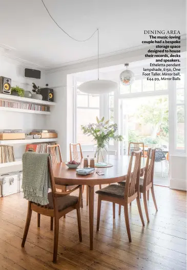  ??  ?? DINING AREA The music-loving couple had a bespoke storage space designed to house their records, decks and speakers. Etheletta pendant lampshade, £150, One Foot Taller. Mirror ball, £44.99, Mirror Balls