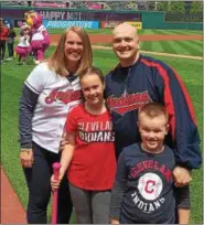  ?? COURTESY JENNIFER BUCKLAND ?? Willoughby resident Jennifer Buckland with husband Erik, son Zack and daughter Ava before the Indians’ May 13 game against the Royals.