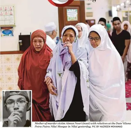  ?? PIC BY HAZREEN MOHAMAD ?? Mother of murder victim Aiman Nosri (inset) with relatives at the Dato’ Klana Petra Putra Nilai Mosque in Nilai yesterday.