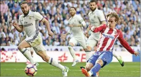  ??  ?? Antoine Griezmann, van Atlético Madrid, maakt hier de 1-1 voor zijn team tegen Real Madrid.
(Foto: ESPN)