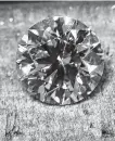  ?? Steve Gonzales / Houston Chronicle ?? Even experts require specialize­d equipment to tell the difference between laboratory-grown, left, and naturally formed diamonds.