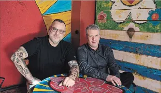  ?? RICARDO DEARATANHA LOS ANGELES TIMES ?? Chefs David McMillan, left, and Frederic Morin of Joe Beef restaurant in Montreal, are authors of the new cookbook, "Joe Beef: Surviving the Apocalypse, Another Cookbook of Sorts."