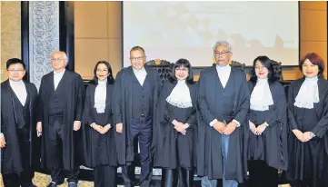  ??  ?? Md Raus Sharif (fourth left) with Rhodzariah (third left), Alizatul Khair (fourth right), Suraya (second right) and Yeoh (right) after the ceremony. Also seen are Chief Judge of Malaya Tan Sri Ahmad Maarop (second left), Court of Appeal president Tan...