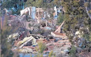 ?? EDDIE MOORE/JOURNAL ?? A guest house located off Old Las Vegas Highway east of Santa Fe was destroyed in an explosion late Monday night.