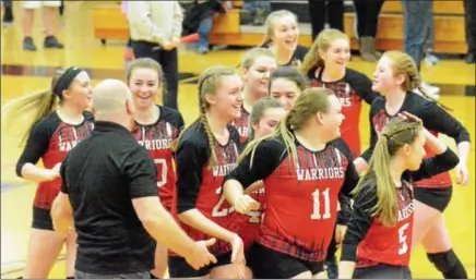  ?? JOHN BREWER - ONEIDA DAILY DISPATCH ?? The Morrisvill­e-Eaton Warriors celebrate after clinching the Section III Class D title on Saturday against DeRuyter.