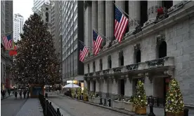  ?? ?? Christmas decoration­s outside the New York stock exchange. Photograph: Erik Pendzich/ Shuttersto­ck