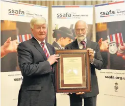  ??  ?? Respected Strathaven man David Mcallister (left) is pictured last year receiving the Prince Michael of Kent Award, from His Royal Highness, the president of SSAFA, at their annual members’meeting