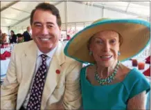  ?? PAUL POST — PPOST@DIGITALFIR­STMEDIA.COM ?? John Hendrickso­n and Marylou Whitney hosted a large Opening Day luncheon on Friday at the Saratoga Race Course At the Rail Pavilion.