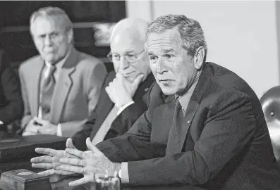  ?? Getty Images file photo ?? President George W. Bush meets with Secretary of Defense Donald Rumsfeld, left, Vice President Dick Cheney and other officials to discuss Iraq in June 2006 at the White House.