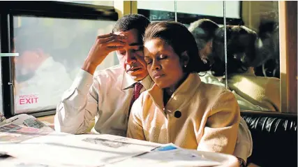  ?? Picture: Obama-Robinson Family Archives ?? An exhausted Michelle Obama and her soon-to-be-president husband Barack on the campaign bus in 2008.