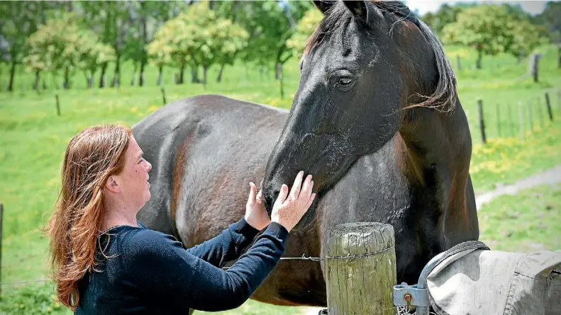  ?? MATTHEW CATTIN/STUFF ?? Dairy Flat vet nurse Alice Hayward wants more common sense this fireworks season.