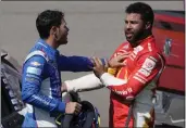  ?? JOHN LOCHER — THE ASSOCIATED PRESS ?? Bubba Wallace, right, and Kyle Larson push each other away after the two crashed during a NASCAR Cup Series auto race Sunday on in Las Vegas.