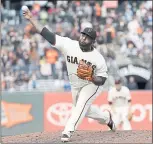  ?? JEFF CHIU — ASSOCIATED PRESS ?? Pablo Sandoval pitches against the Dodgers during Game 1 of the Giants’ doublehead­er on Saturday.