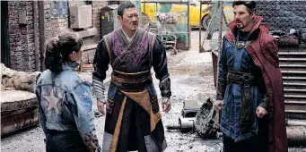  ?? Marvel Studios ?? FROM left: Xochitl Gomez, Benedict Wong and Benedict Cumberbatc­h in Doctor Strange in the Multiverse of Madness. |