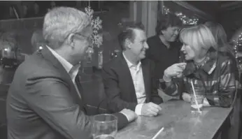  ?? DEB RANSOM/PMO ?? Prime Minister Stephen Harper, left, and wife Laureen met with blues musician Jack de Keyzer at the Rainbow Room in Ottawa in 2012. The Harpers were there to celebrate their anniversar­y.