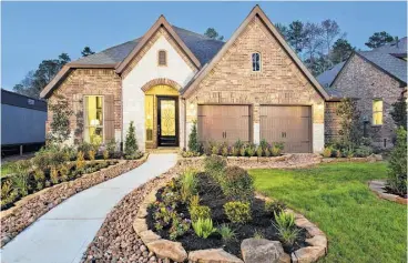  ??  ?? At Grand Central Park, home builder Perry Homes offers the 50’ section, starting in the $280,000s and the 55’ section, from the $290,000s, with one- and two-story designs and open-concept floor plans.