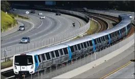  ?? DOUG DURAN — BAY AREA NEWS GROUP ARCHIVES ?? A new “Fleet of the Future” BART train travels along the tracks next to Highway 580on March 26, 2020.