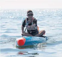  ?? PAIGE TAYLOR WHITE TORONTO STAR ?? By the end of the second day, it became clear that strong winds and massive waves on Lake Ontario would prevent paddleboar­der Mike Shoreman from completing his trip.