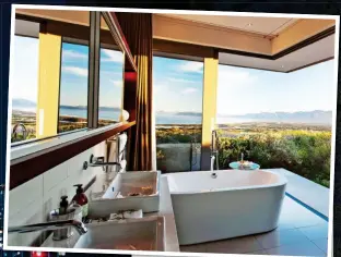  ??  ?? ON TAP: A furo soaking bath, left, at Aman Tokyo. Above: A view of the nature reserve at Grootbos, South Africa