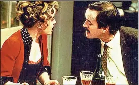  ??  ?? Trading slurs: Basil and Sybil in the classic sitcom Fawlty Towers