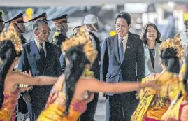  ?? REUTERS ?? Prime Minister Of Japan Fumio Kishida and spouse Yuko Kishida arrive at the VVIP I Terminal of I Gusti Ngurah Rai Airport, Badung, Bali, Indonesia, Nov. 13. Kishida is to attend the G20 Summit which takes place on Nov. 15-16.