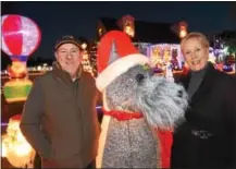  ??  ?? For the past 10 years Jerry and Jean Corrado have turned their home at 1102 Nobb Hill Drive in East Bradford into an oasis of Christmas lights and displays. The couple uses the display to collect toys to be donated to children admitted to the emergency...