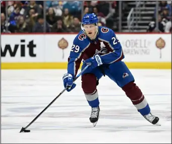  ?? ANDY CROSS — THE DENVER POST ?? Colorado Avalanche center Nathan Mackinnon (29) in the third period against the Detroit Red Wings at Ball Arena in Denver on Wednesday, March 06.