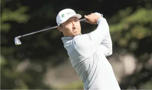  ?? JAMIE SQUIRE/GETTY IMAGES ?? Li Haotong, 25, shot a 5-under 65 at Harding Park. Li holds a two-stroke edge and is the first player from China to lead after any round of a major.
