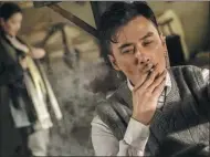  ?? PROVIDED TO CHINA DAILY ?? A smoking scene from the spy-themed TV drama Flying Kite.