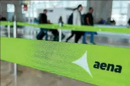  ?? SANTOS MOURA/FILE PHOTO PHOTO: REUTERS/VIOLETA ?? The logo of Spanish airports operator Aena is seen at the Adolfo Suarez Barajas airport in Madrid.