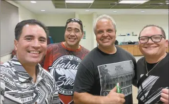  ?? ?? Kamehameha Schools Maui music teacher Clarke Tuitele (from right) poses for a photo with Kaleo Phillips, Mark Palakiko and Kapena DeLima.