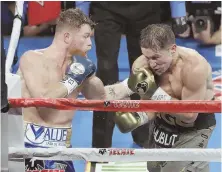  ?? AP PHOTO ?? SIX, TWO AND EVEN: Canelo Alvarez and Gennady Golovkin staged an outstandin­g fight last night in Las Vegas, but one where judging was again center stage.