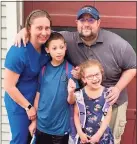  ?? Contribute­d photo ?? Ashley Balestrier­e, with husband Philip, hopes a vaccine trial can help her children Jimmy, 10, and Amy Ruth, 7, have a normal childhood.