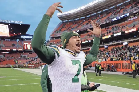  ?? JIM MATTHEWS/USA TODAY NETWORK-WISCONSIN ?? Packers QB Brett Hundley celebrates after winning in overtime Sunday against the Browns.