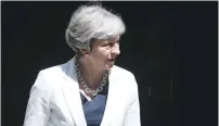  ?? (Toby Melville/Reuters) ?? BRITAIN’S PRIME MINISTER Theresa May is seen at 10 Downing Street yesterday.