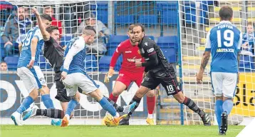  ??  ?? ■ Michael O’Halloran scores his second of the match.