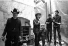  ?? ?? Tracy Pew, Nick Cave, Phill Calvert, Mick Harvey and Roland S Howard in a disused church in Kilburn, west London, in October 1981. Photograph: David Corio/Getty Images