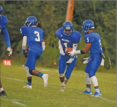  ?? Terrance Armstard/News-Times ?? Keep your eye on the ball: Strong's LeAndrew Greer gets ready to take the handoff during the Bulldogs' game against Mineral Springs last year. After missing the playoffs in each of the last two seasons, Sirl Wright, who was recently hired as Strong's football coach, is hoping to get the Bulldogs back to the postseason.