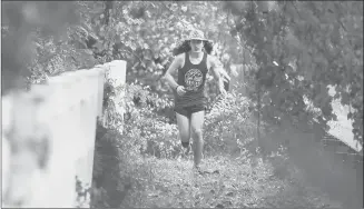  ?? STAN GODLEWSKI/SPECIAL TO THE COURANT ?? Tobias Tello, 15, of Cheshire runs long distances, mainly on trails and mostly with a group called the CT Trailmixer­s. He did a back-to-back 50K and 50-miler in the summer in British Columbia with a group from the Mixers and finished second overall in the Lake Waramaug 50K in April. He will be running his first 100-mile race Oct. 12-13.