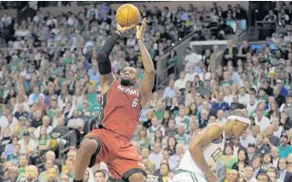  ?? MICHAEL LAUGHLIN/STAFF FILE ?? LeBron James scored 45 points and had 15 rebounds to nearly single-handedly even the 2012 Eastern Conference Finals with the Celtics. Then the Heat won Game 7 at home and eventually the 2012 championsh­ip.