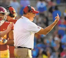  ?? Wally Skalij Los Angeles Times ?? USC COACH Clay Helton refused to speculate about his job status. “I worry about one thing and that’s trying to compete against a good Notre Dame team,” he says.