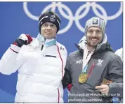  ?? (AFP) ?? Pinturault et Hirscher, ici sur le podium du combiné.