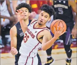  ?? Jayne Kamin-Oncea Getty Images ?? BENNIE BOATWRIGHT, who is averaging 14.2 points and 6.4 rebounds for the Trojans this season, has been slowed and sidelined by a foot injury.