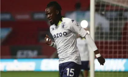  ??  ?? Bertrand Traoré celebrates after putting Aston Villa 2-0 up at Bristol City. Photograph: Geoff Caddick/Reuters