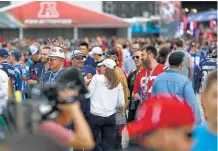  ?? Michael Ciaglo / Houston Chronicle file ?? Fans arrive for the Super Bowl at NRG Stadium on Feb. 5.